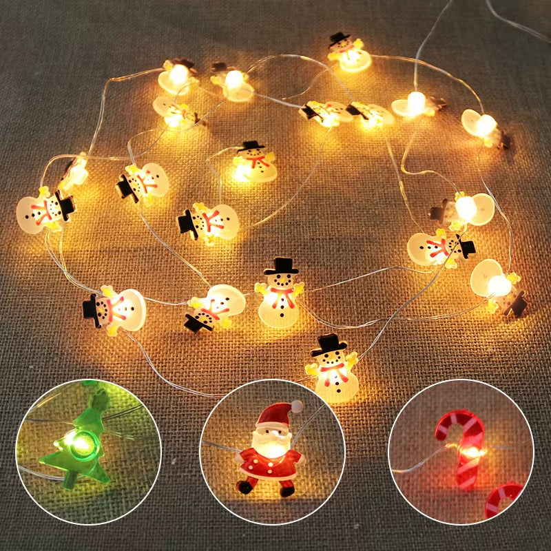 Illuminate Your Holidays with 2M 20LED Warm White Christmas String Lights Featuring Santa Claus, Snowflakes, and Snowman Designs for Festive Home Decor