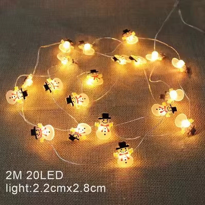 Illuminate Your Holidays with 2M 20LED Warm White Christmas String Lights Featuring Santa Claus, Snowflakes, and Snowman Designs for Festive Home Decor