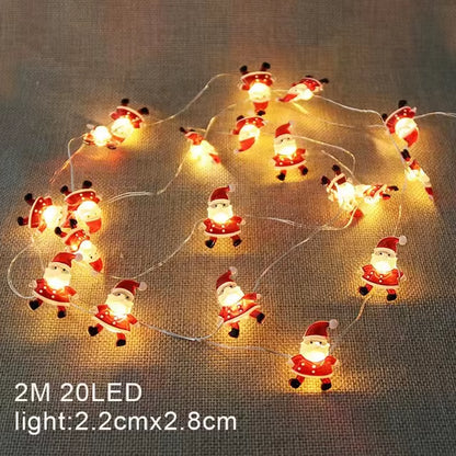 Illuminate Your Holidays with 2M 20LED Warm White Christmas String Lights Featuring Santa Claus, Snowflakes, and Snowman Designs for Festive Home Decor